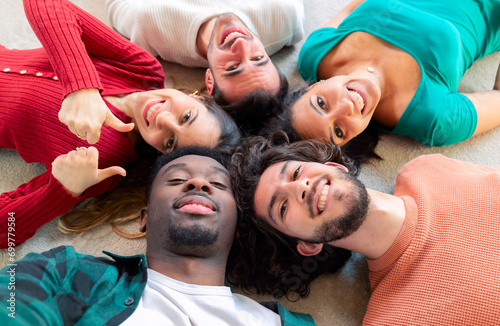 Friends  top view with circle selfie  happiness or diversity for social media post  app or blog. Men  woman and students for photography  profile picture or solidarity with lying on ground