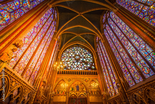 PARIS, FRANCE - OCTOBER 08: Stained glass windows of Saint Chapelle with rose window, medieval church of 13c., Paris France © neirfy
