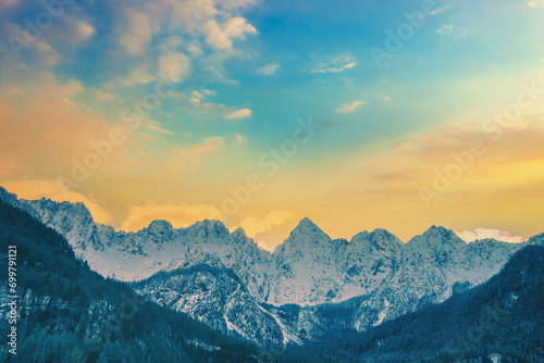 View of the Alps in Gozd Martuljek at sunrise. The tops of the mountains are covered with snow. Triglav national park. Slovenia, Europe photo