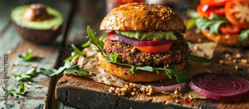 Vegan burger with avocado dressing made from beets and quinoa photo