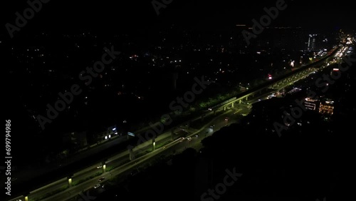 Night hyperlapse drone shot of a road 