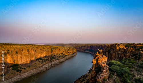 sunset over the river. The forgotten gorge of Gandikota situated on the Pennar River in Andhra Pradesh, India. photo
