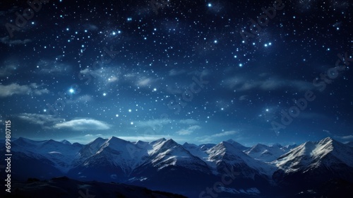  the night sky is full of stars and the mountains are silhouetted against the backdrop of snow - capped mountains.