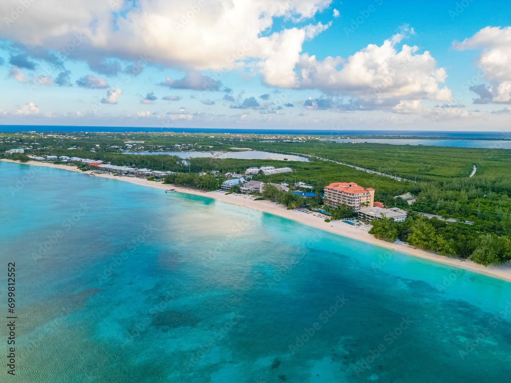 Beautiful aerial view of the Cayman Islands in the Caribbean with pristine beach turquoise blue green water sea ocean Beautiful aerial view of the Cayman Islands in the Caribbean with pristine beach turquoise blue green water sea ocean