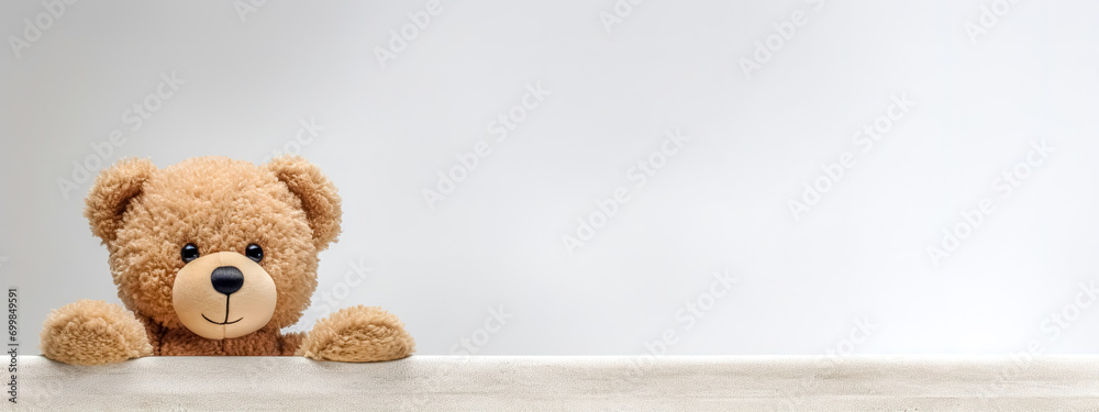 Teddy bear on a neutral background, banner with copy space - obrazy, fototapety, plakaty 