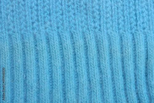 blue fabric texture of wool striped knitted garment