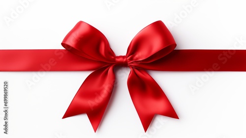 Red ribbon bow with long, straight ribbon for banner, isolated on white background with copy space