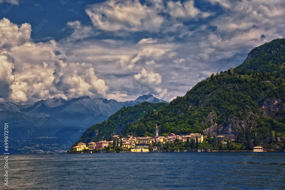 Lake Como town view from a boat in Northern Italy’s Lombardy region at the foothills of the Alps, Europe.