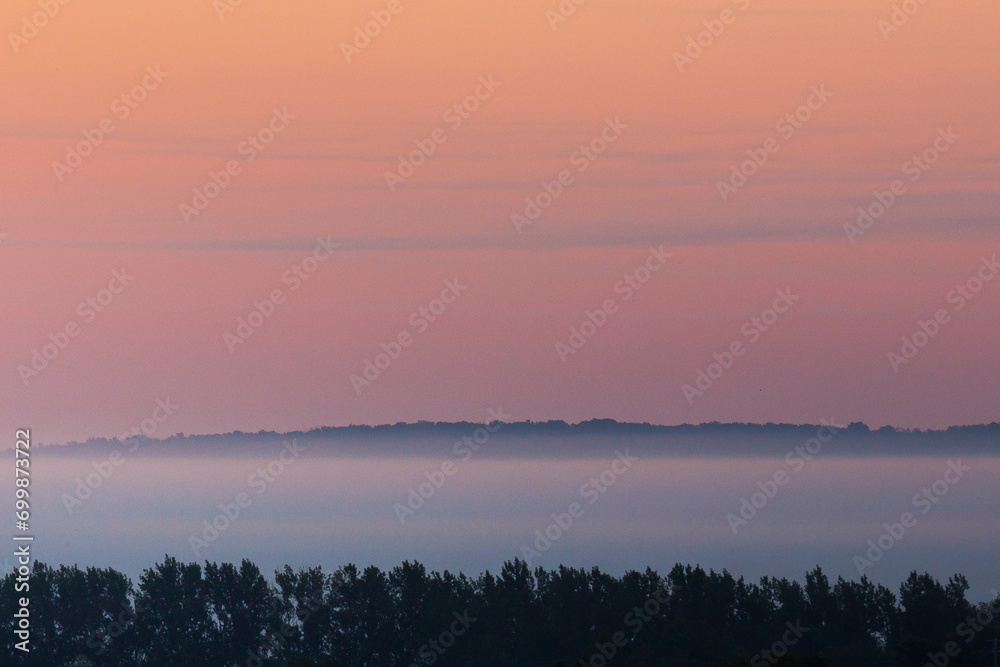 Sunrise over fog