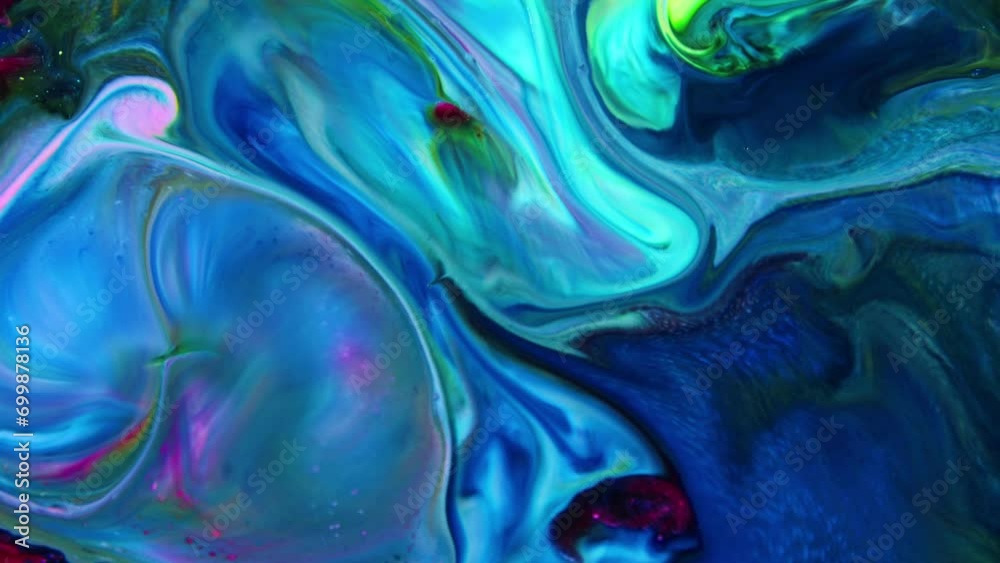 This stock video features a slow motion footage of oil paint motion, where Paint pigment are separated by light paint. Use this clip as background for creative concept videos, presentations, and more.