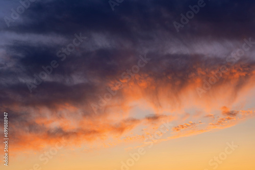 Colorful sunset with clouds in the evening, Fantastic view of the dark overcast sky. Dramatic and picturesque morning scene, Panorama of a textured purple sky at sunset