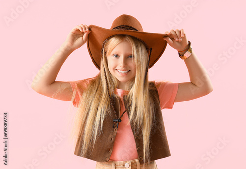 Little cowgirl on pink back...