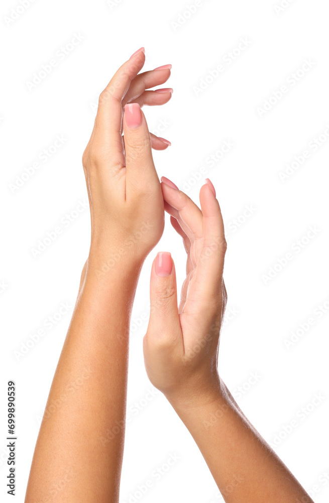 Woman showing hands with nude manicure on white background, closeup Woman showing hands with nude manicure on white background, closeup