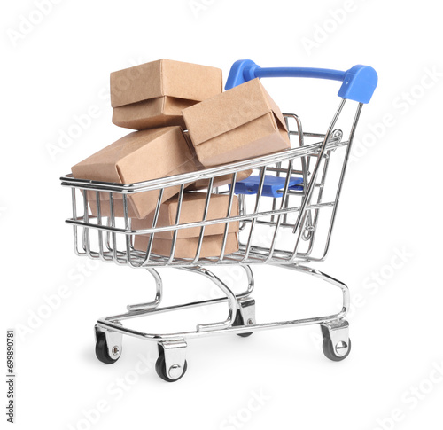 Small metal shopping cart with boxes isolated on white