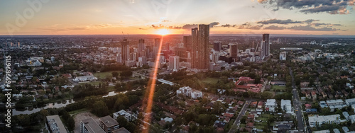 Panoramic aerial drone view of Parramatta cbd in Sydney, NSW Australia during a late afternoon sunset in December 2023 photo