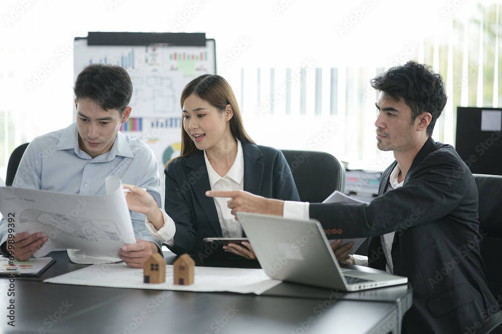 Asia business meeting consultations of business people in the company's meeting room. Asia business meeting consultations of business people in the company's meeting room.