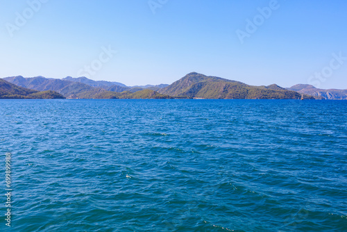 View of mountain landscapes from the sea. Background with selective focus and copy space