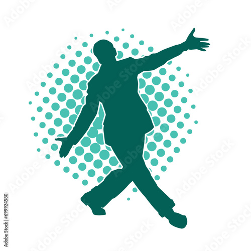 Silhouette of a man in dancing pose. Silhouette of a male dancer in performing pose.
