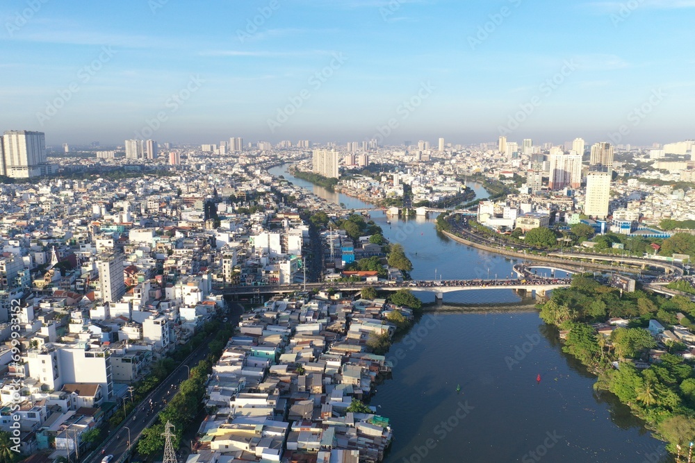 Ho chi minh City, Vietnam - Dec 13, 2023 4k aerial view of District 8 skyline look from District 4 during early morning