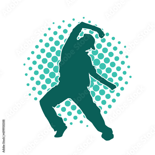 Silhouette of a man in dancing pose. Silhouette of a male dancer in performing pose.