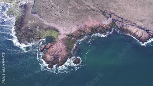 Drone view of Panoramic view of the coastline of the marine park protected area of Bahia Bustamante, Chubut Province, Argentina photo