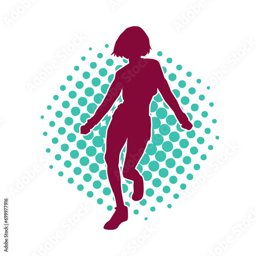 Silhouette of a casual female in a dancing pose. Silhouette of a dancer woman in action pose.