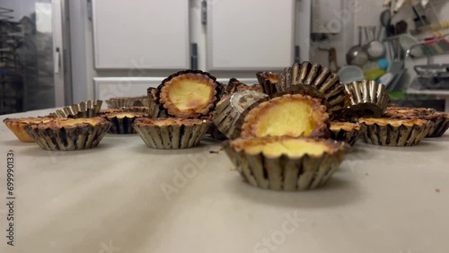 Traditional bakery scne crafting artisanal cupcakes. Spain. photo