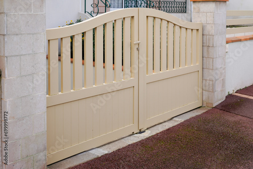 steel classic beige round color sand metal gate fence of house street view