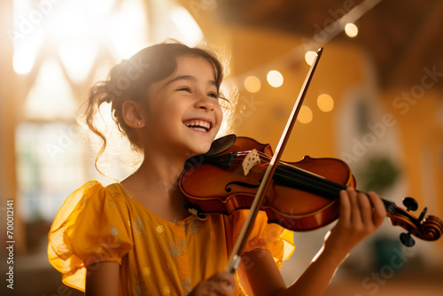 young girl playing violin bokeh style background photo