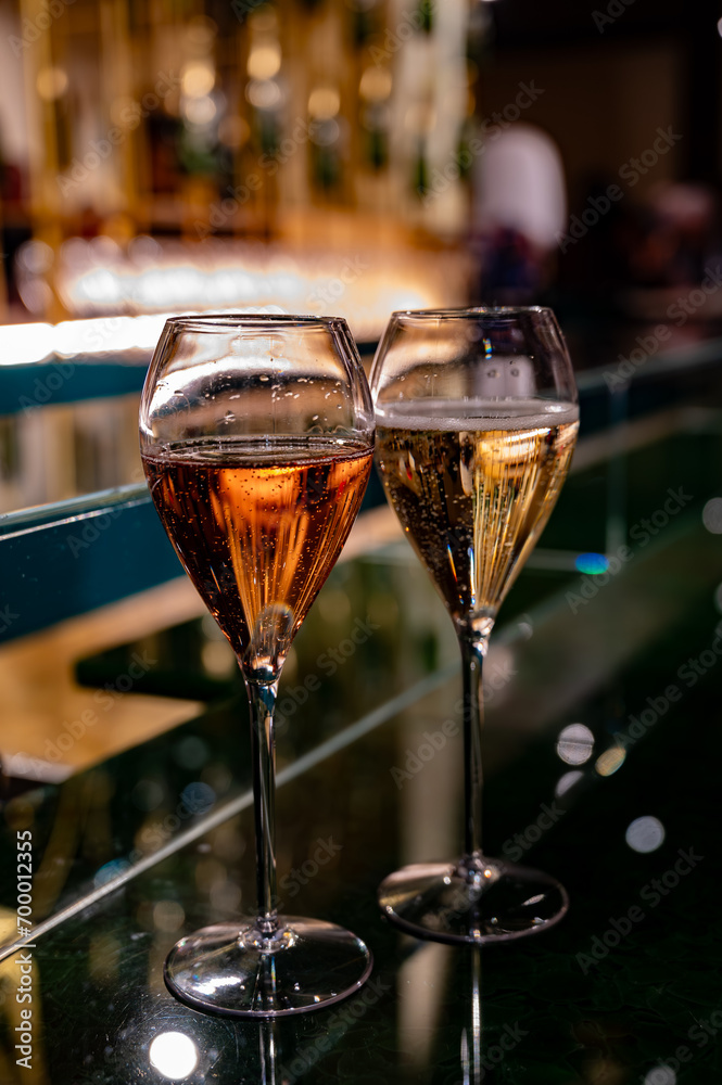 Fototapeta premium Tasting of sparkling wine champagne on winter weekend festival in December on Avenue de Champagne, Epernay, Champagne region, France