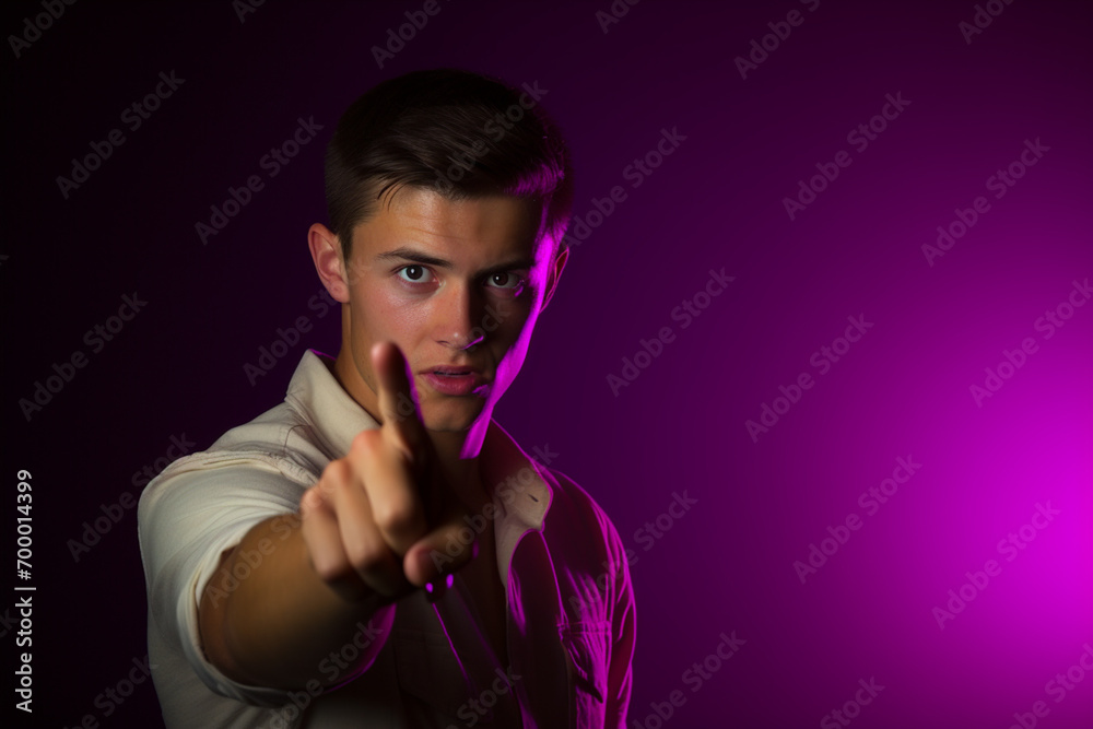 a handsome man pointing forward a handsome man pointing forward