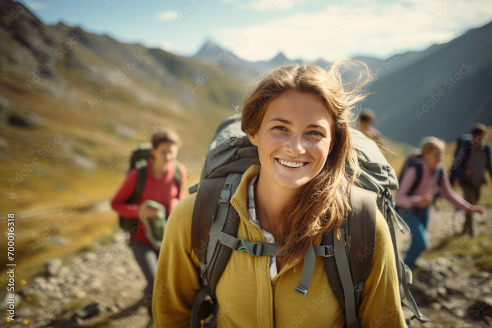 hiker smiling on the mountains bokeh style background