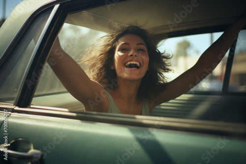 african american woman celebrating in the car for her road trip bokeh style background