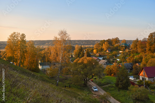 Autumn countryside valley in Maloyaroslavets town at sunset photo