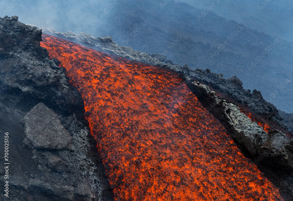 Eruptive vent with lava emis at the top of the Etna volcano