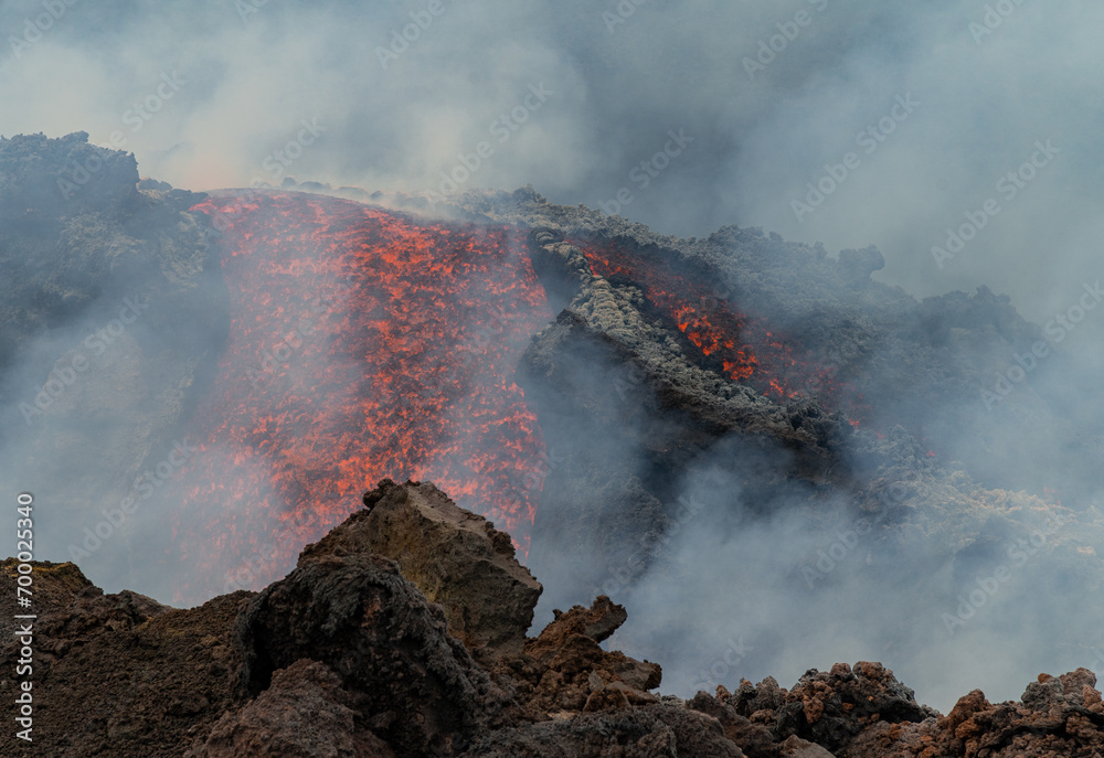 Eruptive vent with lava emis at the top of the Etna volcano