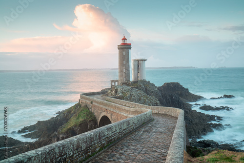 One of the most beautiful lighthouses at sunset. Phare de Petit Minou on the coast of Brittany, France, Europe photo