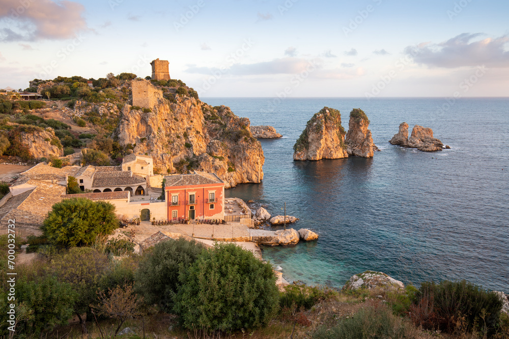Unbelievable scene of Tonnara di Scopello. Popular travel destination on Mediterranean sea. Location: Scopello, Province of Trapani, Sicily, Italy, Europe. Traveling concept background.
