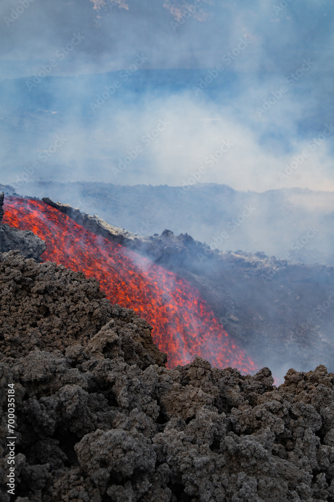 Eruptive vent with lava emis at the top of the Etna volcano