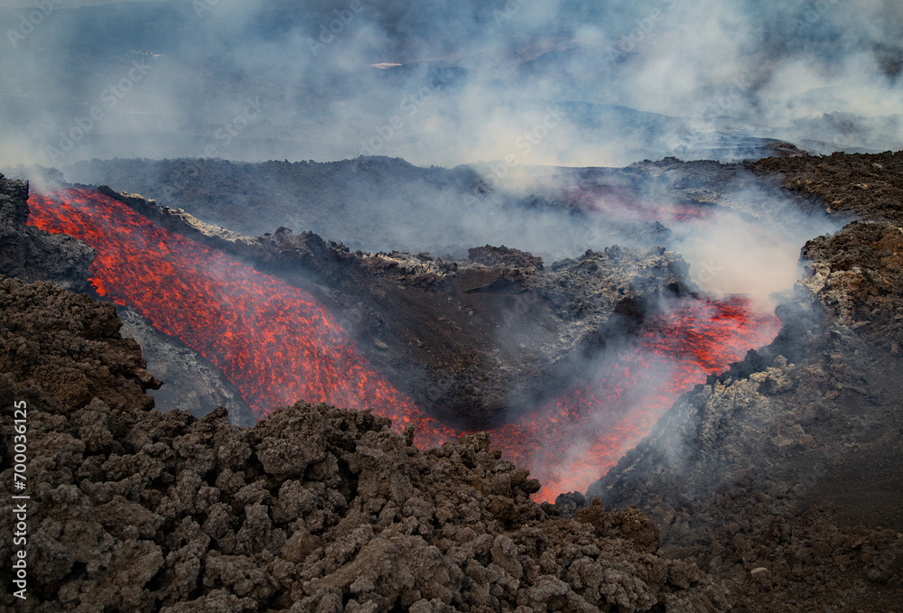 Eruptive vent with lava emis at the top of the Etna volcano