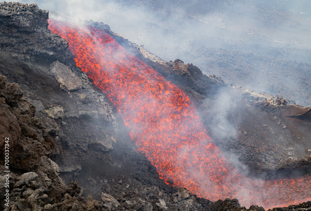 Eruptive vent with lava emis at the top of the Etna volcano