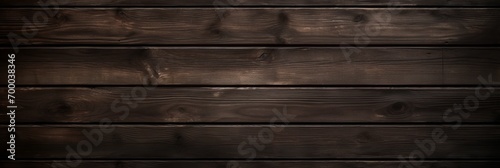 Top view of dark wooden texture background with rich natural colors and detailed grain pattern