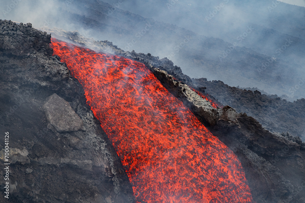 Eruptive vent with lava emis at the top of the Etna volcano