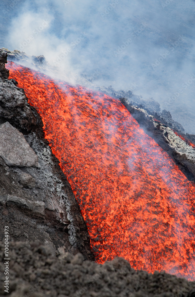 Eruptive vent with lava emis at the top of the Etna volcano