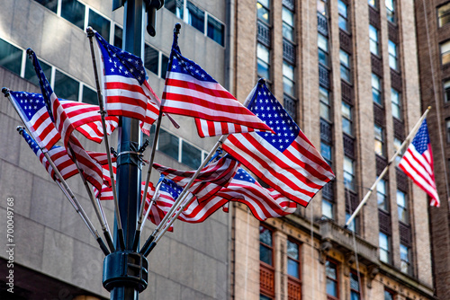 American flags waving on the lampposts of the Big Apple districts, as in the whole Manhattan of New York, in the United States of America.