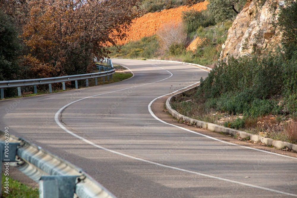 Curvy stretch of road in the interior region of Spain ideal for motorcycling travelers Curvy stretch of road in the interior region of Spain ideal for motorcycling travelers