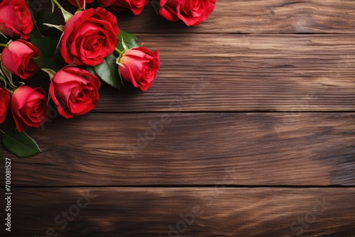 Valentine's Day background with roses on wooden board.