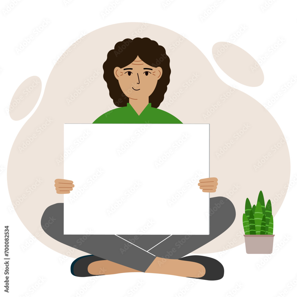 A woman sits cross-legged and holds a large white sheet with space for text. Advertising, poster, information, announcement. A woman sits cross-legged and holds a large white sheet with space for text. Advertising, poster, information, announcement.