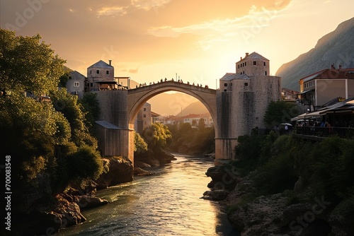 The Mostar Old Bridge, a UNESCO site, spans the Neretva River in Bosnia and Herzegovina, a symbol of cultural heritage and historical significance. photo