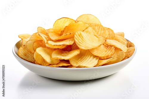 Potato chips arranged prettily on a white plate photo